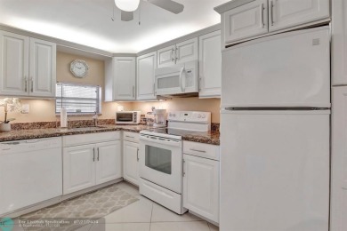 Bright Full Two Bedroom Corner With Water View On Par 3 Golf on Hollybrook Golf and Tennis Club  in Florida - for sale on GolfHomes.com, golf home, golf lot