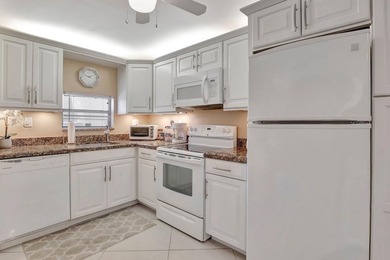 Bright Full Two Bedroom Corner With Water View On Par 3 Golf on Hollybrook Golf and Tennis Club  in Florida - for sale on GolfHomes.com, golf home, golf lot