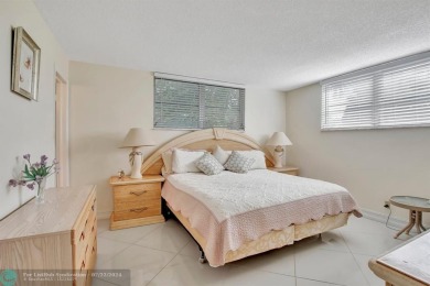 Bright Full Two Bedroom Corner With Water View On Par 3 Golf on Hollybrook Golf and Tennis Club  in Florida - for sale on GolfHomes.com, golf home, golf lot