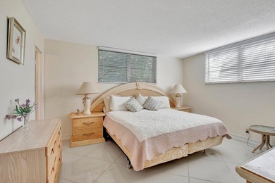 Bright Full Two Bedroom Corner With Water View On Par 3 Golf on Hollybrook Golf and Tennis Club  in Florida - for sale on GolfHomes.com, golf home, golf lot