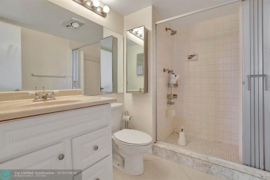 Bright Full Two Bedroom Corner With Water View On Par 3 Golf on Hollybrook Golf and Tennis Club  in Florida - for sale on GolfHomes.com, golf home, golf lot