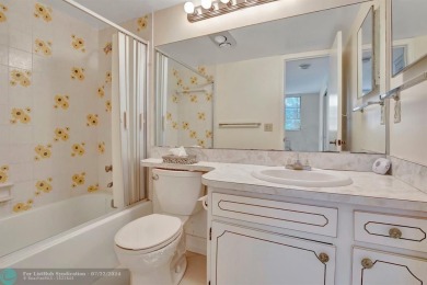 Bright Full Two Bedroom Corner With Water View On Par 3 Golf on Hollybrook Golf and Tennis Club  in Florida - for sale on GolfHomes.com, golf home, golf lot