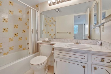 Bright Full Two Bedroom Corner With Water View On Par 3 Golf on Hollybrook Golf and Tennis Club  in Florida - for sale on GolfHomes.com, golf home, golf lot