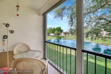 Bright Full Two Bedroom Corner With Water View On Par 3 Golf on Hollybrook Golf and Tennis Club  in Florida - for sale on GolfHomes.com, golf home, golf lot