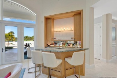 Discover your coastal contemporary dream home in the prestigious on Sailfish Point Golf Club, Inc. in Florida - for sale on GolfHomes.com, golf home, golf lot