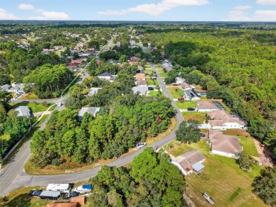 BUILD YOUR DREAM HOME on this spacious 0.40-acre CORNER lot on Oak Hills Country Club in Florida - for sale on GolfHomes.com, golf home, golf lot