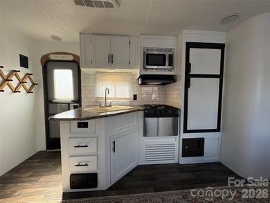 Welcome to easy lake living inside the gated community of Badin on Old North State Club at Uwharrie Point Golf community in North Carolina - for sale on GolfHomes.com, golf home, golf lot