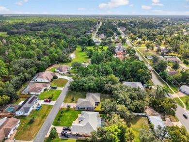 BUILD YOUR DREAM HOME on this spacious 0.40-acre CORNER lot on Oak Hills Country Club in Florida - for sale on GolfHomes.com, golf home, golf lot