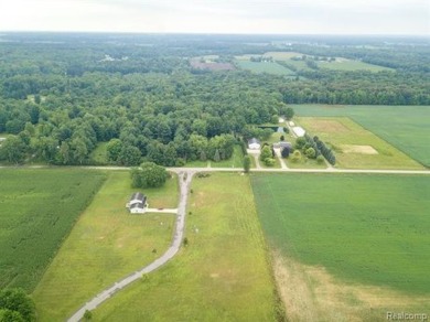 Vacant land in the prestigious Timber Point Estates ready for on The Timbers Golf Club in Michigan - for sale on GolfHomes.com, golf home, golf lot