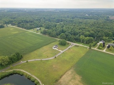 Vacant land in the prestigious Timber Point Estates ready for on The Timbers Golf Club in Michigan - for sale on GolfHomes.com, golf home, golf lot