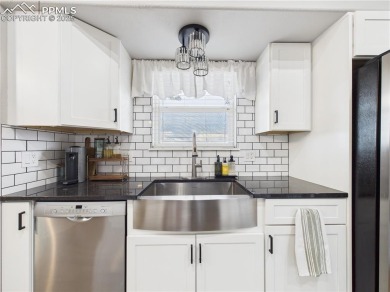 Experience luxury and comfort in this beautiful 2-story home on Desert Hawk At Pueblo West in Colorado - for sale on GolfHomes.com, golf home, golf lot