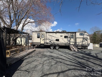 Welcome to easy lake living inside the gated community of Badin on Old North State Club at Uwharrie Point Golf community in North Carolina - for sale on GolfHomes.com, golf home, golf lot