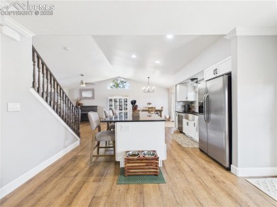 Experience luxury and comfort in this beautiful 2-story home on Desert Hawk At Pueblo West in Colorado - for sale on GolfHomes.com, golf home, golf lot