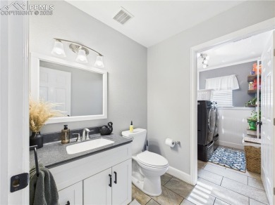 Experience luxury and comfort in this beautiful 2-story home on Desert Hawk At Pueblo West in Colorado - for sale on GolfHomes.com, golf home, golf lot