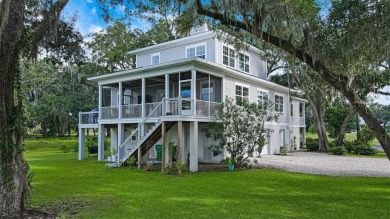 Welcome to your dream home in the picturesque Cooper's Point on Sapelo Hammock Golf Club in Georgia - for sale on GolfHomes.com, golf home, golf lot