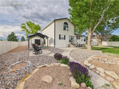 Experience luxury and comfort in this beautiful 2-story home on Desert Hawk At Pueblo West in Colorado - for sale on GolfHomes.com, golf home, golf lot