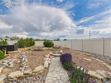 Experience luxury and comfort in this beautiful 2-story home on Desert Hawk At Pueblo West in Colorado - for sale on GolfHomes.com, golf home, golf lot