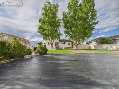 Experience luxury and comfort in this beautiful 2-story home on Desert Hawk At Pueblo West in Colorado - for sale on GolfHomes.com, golf home, golf lot