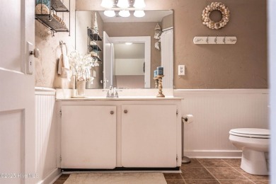 Look at this charming historic home with modern updates on an on Whispering Woods in North Carolina - for sale on GolfHomes.com, golf home, golf lot