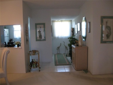 IRONWOOD.  NOT 55+.  2BR/2BA 5th. Floor End Unit Home.  Elevator on Pinebrook/Ironwood Golf Course in Florida - for sale on GolfHomes.com, golf home, golf lot
