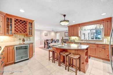 STUNNING home overlooking the 3rd, 4th 9th & 18th hole of the on Rockledge Country Club in Florida - for sale on GolfHomes.com, golf home, golf lot
