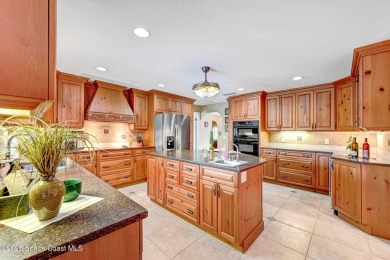 STUNNING home overlooking the 3rd, 4th 9th & 18th hole of the on Rockledge Country Club in Florida - for sale on GolfHomes.com, golf home, golf lot
