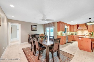 STUNNING home overlooking the 3rd, 4th 9th & 18th hole of the on Rockledge Country Club in Florida - for sale on GolfHomes.com, golf home, golf lot
