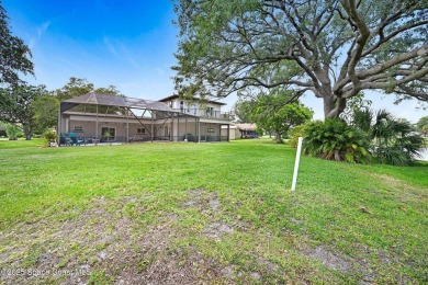 STUNNING home overlooking the 3rd, 4th 9th & 18th hole of the on Rockledge Country Club in Florida - for sale on GolfHomes.com, golf home, golf lot