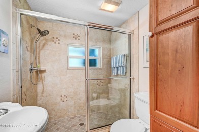 STUNNING home overlooking the 3rd, 4th 9th & 18th hole of the on Rockledge Country Club in Florida - for sale on GolfHomes.com, golf home, golf lot
