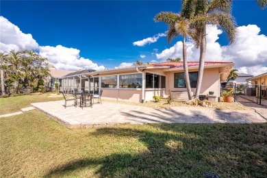 Impressive WATERFRONT 3 Bedroom, 2 Bathroom home with attached 2 on Saint Andrews South Golf Club in Florida - for sale on GolfHomes.com, golf home, golf lot