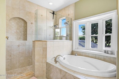 STUNNING home overlooking the ROCKLEDGE COUNTRY CLUB 3rd, 4th on Rockledge Country Club in Florida - for sale on GolfHomes.com, golf home, golf lot