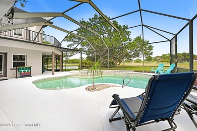 STUNNING home overlooking the ROCKLEDGE COUNTRY CLUB 3rd, 4th on Rockledge Country Club in Florida - for sale on GolfHomes.com, golf home, golf lot