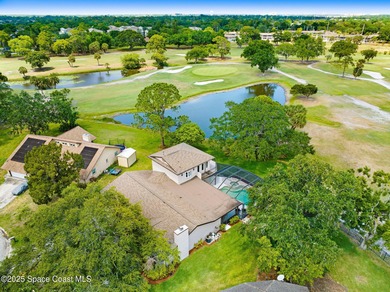 STUNNING home overlooking the ROCKLEDGE COUNTRY CLUB 3rd, 4th on Rockledge Country Club in Florida - for sale on GolfHomes.com, golf home, golf lot