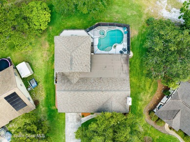 STUNNING home overlooking the ROCKLEDGE COUNTRY CLUB 3rd, 4th on Rockledge Country Club in Florida - for sale on GolfHomes.com, golf home, golf lot