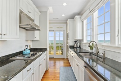 This exceptional oceanfront home in Roosevelt Beach showcases on The Country Club of the Crystal Coast in North Carolina - for sale on GolfHomes.com, golf home, golf lot