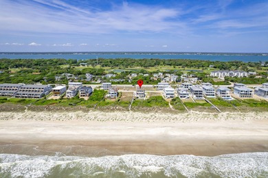 This exceptional oceanfront home in Roosevelt Beach showcases on The Country Club of the Crystal Coast in North Carolina - for sale on GolfHomes.com, golf home, golf lot