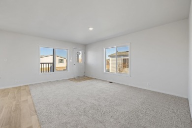 Discover a fresh, low-maintenance lifestyle in this newly on Rapid City Elks Golf Course in South Dakota - for sale on GolfHomes.com, golf home, golf lot