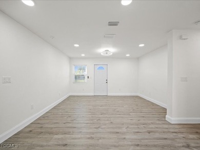 Charming 3-bedroom, 2-bathroom home nestled in the heart of Port on Port Charlotte Golf Club in Florida - for sale on GolfHomes.com, golf home, golf lot