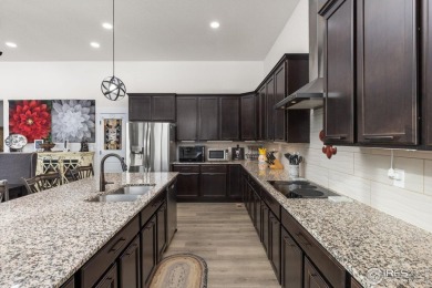 This stunning corner-lot home built in 2019 is a must-see! on Raindance National Golf Course in Colorado - for sale on GolfHomes.com, golf home, golf lot