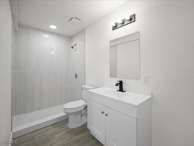 Charming 3-bedroom, 2-bathroom home nestled in the heart of Port on Port Charlotte Golf Club in Florida - for sale on GolfHomes.com, golf home, golf lot