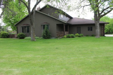 Check out this gorgeous two-story twin home with a stunning on Moccasin Creek Country Club in South Dakota - for sale on GolfHomes.com, golf home, golf lot