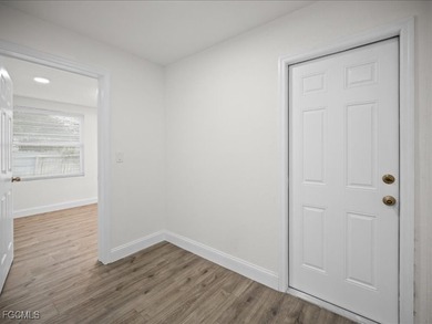 Charming 3-bedroom, 2-bathroom home nestled in the heart of Port on Port Charlotte Golf Club in Florida - for sale on GolfHomes.com, golf home, golf lot