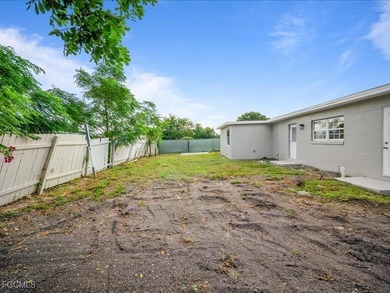 Charming 3-bedroom, 2-bathroom home nestled in the heart of Port on Port Charlotte Golf Club in Florida - for sale on GolfHomes.com, golf home, golf lot