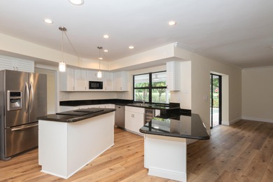 Now  presenting the newest house on the market  located at the on Yacht and Country Club in Florida - for sale on GolfHomes.com, golf home, golf lot