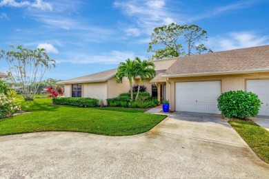 As you enter this exceptional 3/2 villa,you are immediately on Eastpointe Country Club in Florida - for sale on GolfHomes.com, golf home, golf lot