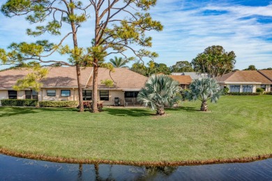 As you enter this exceptional 3/2 villa,you are immediately on Eastpointe Country Club in Florida - for sale on GolfHomes.com, golf home, golf lot