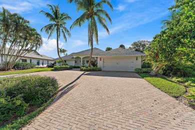 This beautifully designed home is a dream come true for those on Tequesta Country Club in Florida - for sale on GolfHomes.com, golf home, golf lot