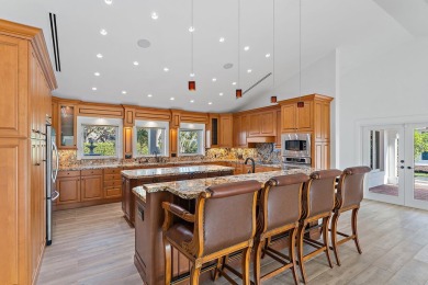 This beautifully designed home is a dream come true for those on Tequesta Country Club in Florida - for sale on GolfHomes.com, golf home, golf lot