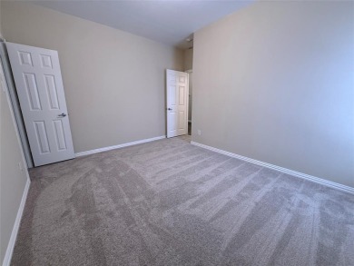 Lovely home with beautiful golf course views. carpet and on WestRidge Golf Course in Texas - for sale on GolfHomes.com, golf home, golf lot