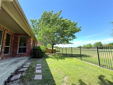 Lovely home with beautiful golf course views. carpet and on WestRidge Golf Course in Texas - for sale on GolfHomes.com, golf home, golf lot